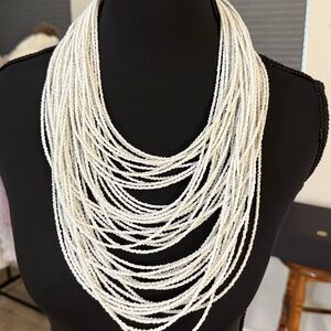 Elegant Multi-Strand White Beaded Necklace